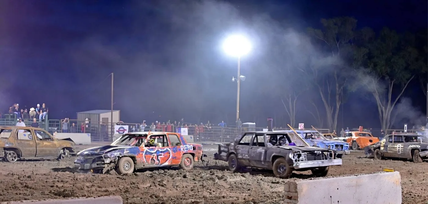 Night demolition derby action under the lights at Grand View.