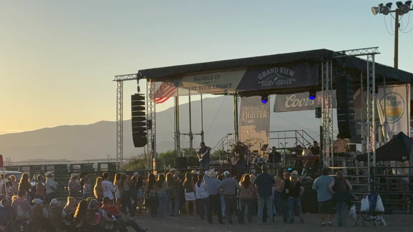 Live concert on the Grand View stage at sunset.